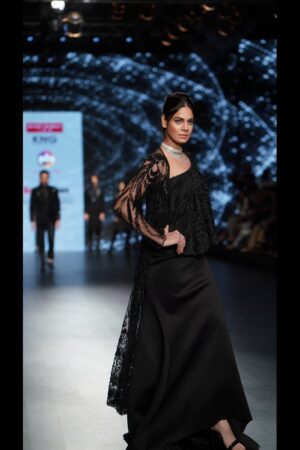 Dramatic one-shoulder scuba lycra gown